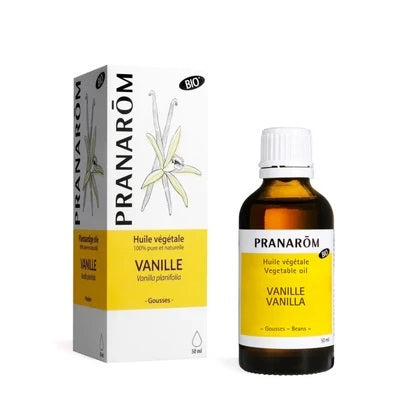 BOUTEILLE D'HUILE VÉGÉTALE DE VANILLE AVEC SON EMBALLAGE