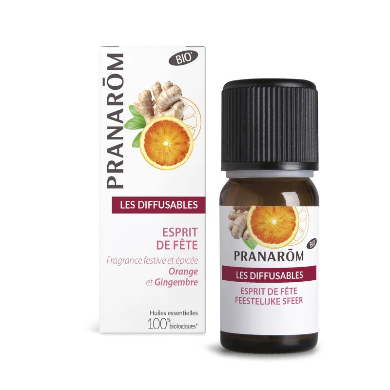 MÉLANGE D'HUILES ESSENTIELLES LES DIFFUSABLES FRAGRANCE TEMPS OU ESPRIT DES FÊTES (ORANGE ET GINGEMBRE)  DE MARQUE PRANAROM ET SON EMBALLAGE